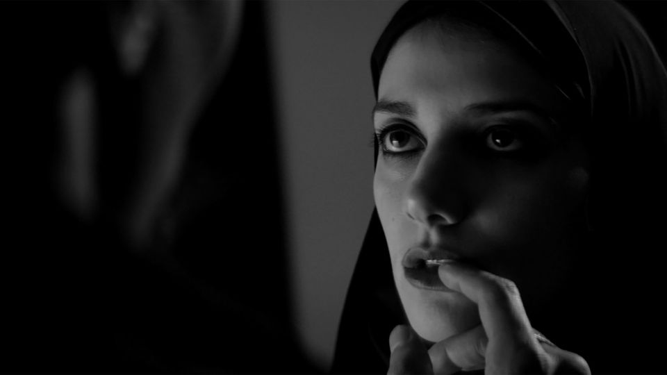 A girl walks home alone at night